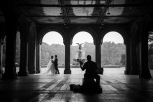 couple with musicians and the fountain central park bethesda terrace