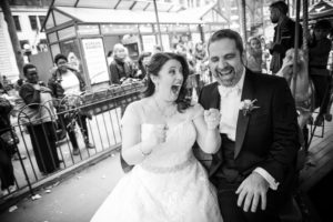 wedding day portraits couple on merry go round