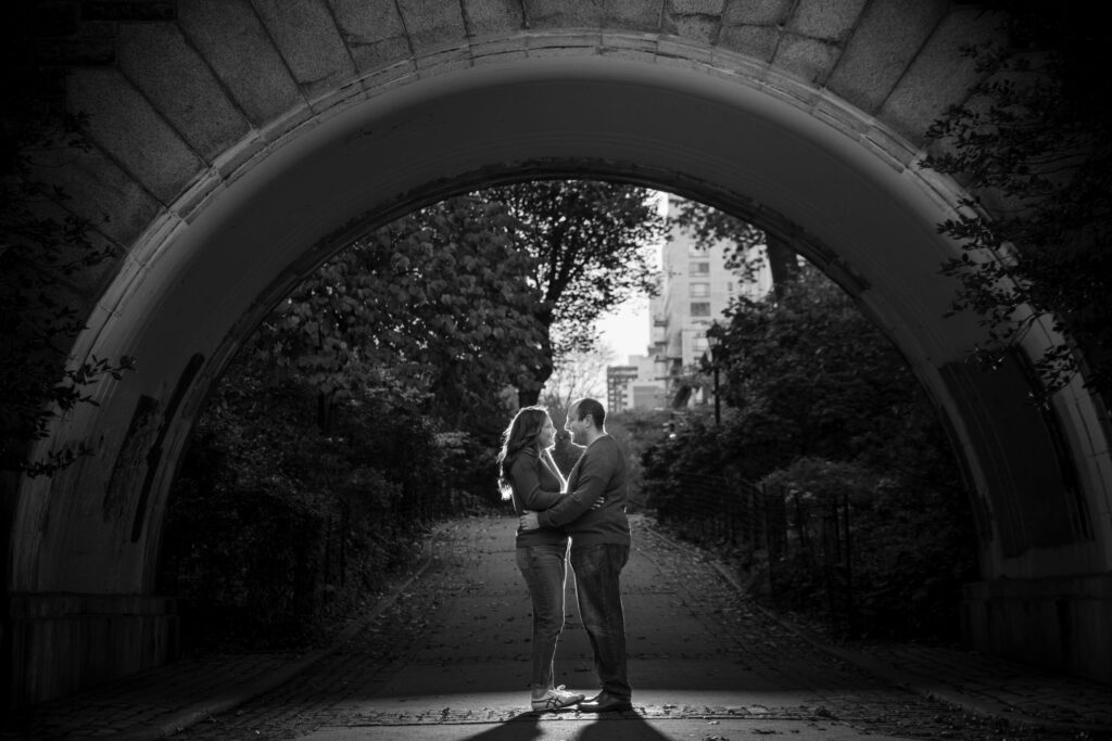 carl schurz park engagement photo under archway