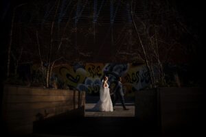 brooklyn winery wedding outdoor photos bride and groom with graffiti