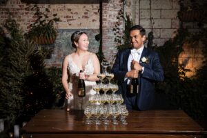 brooklyn winery wedding pouring champagne