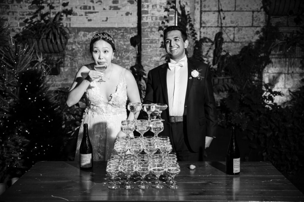 brooklyn winery wedding pouring champagne tower