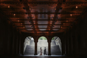 wedding day portrait couple under arches bethesda terrace central park