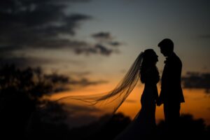oheka castle wedding nighttime sunset wedding photo bride and groom