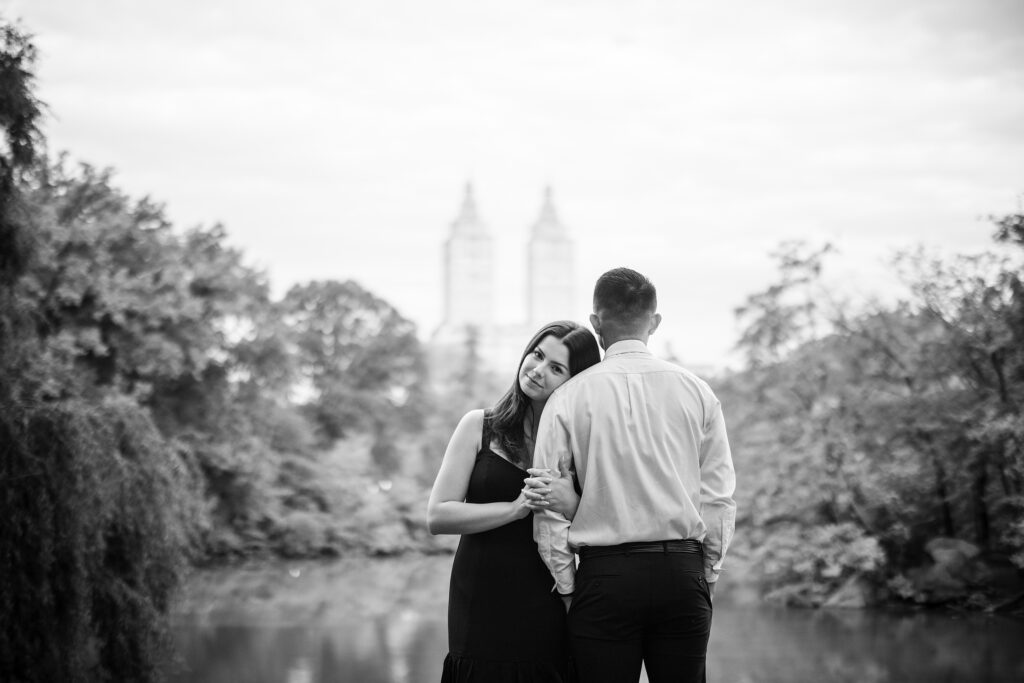 An engagement session featuring a black and white photo of a couple in central park.