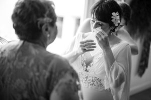 A bride is getting ready for her wedding photojournalism