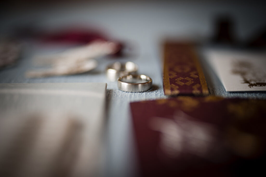 Wedding rings on a table.