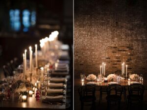 A romantic wedding setup at the Wythe Hotel, featuring a long table adorned with candles against a rustic brick wall.