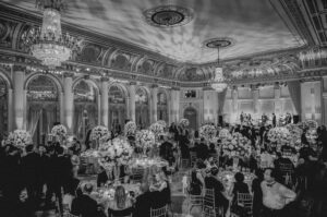 A black and white photo of a wedding reception at the Plaza Hotel.