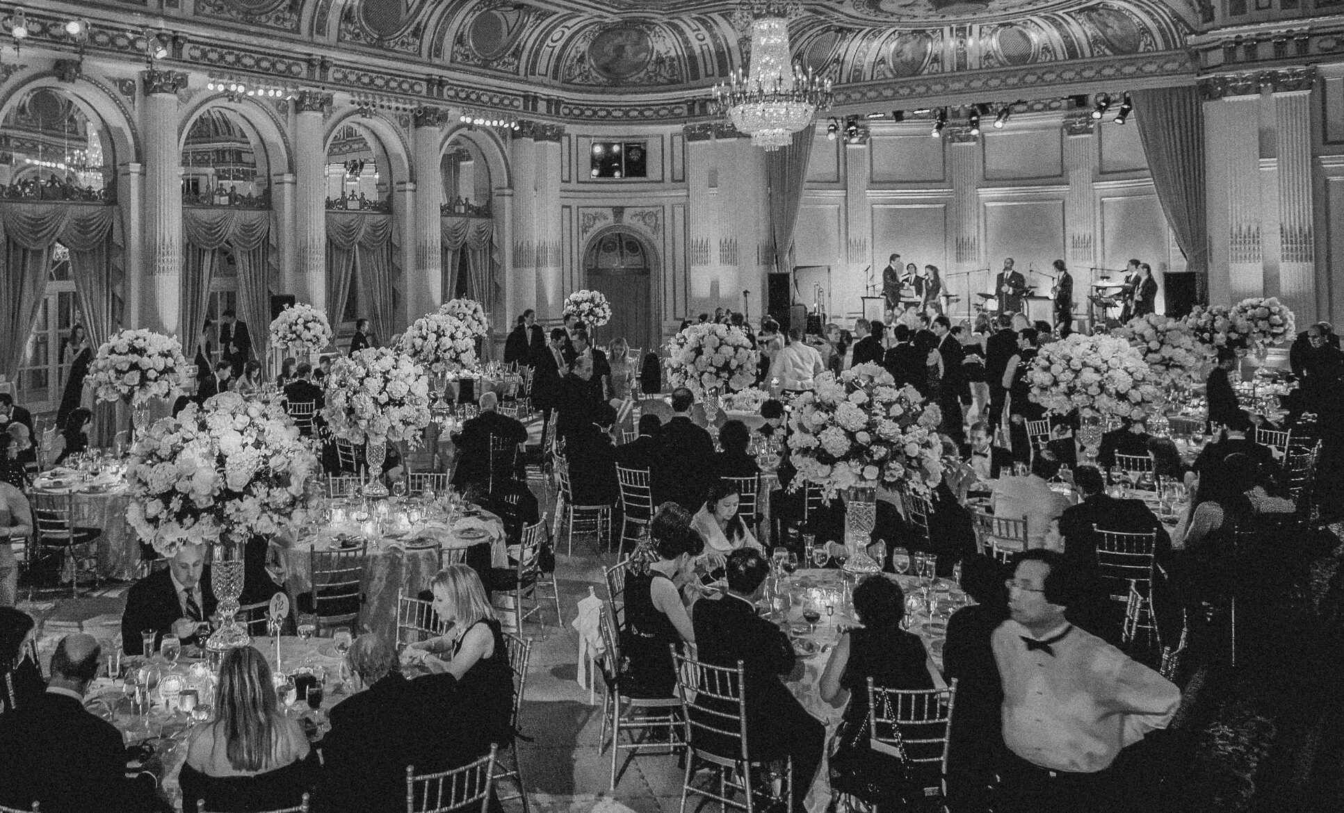 A black and white photo of a wedding reception at the Plaza Hotel.