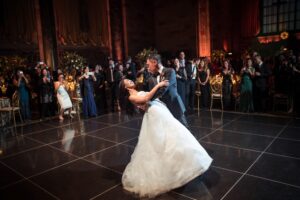 A bride and groom gracefully share their first dance at a Cipriani wedding reception.