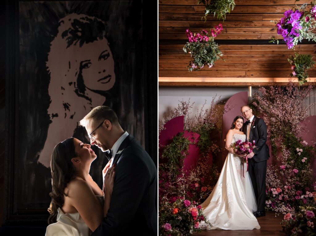 A bride and groom posing in front of a flower wall at their Modernhaus wedding.