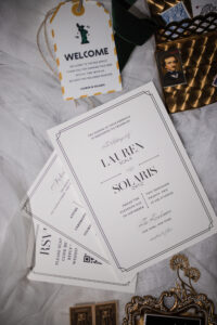 A set of wedding invitation cards and envelopes.