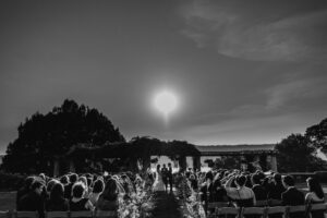A black and white photo of a Wave Hill wedding ceremony