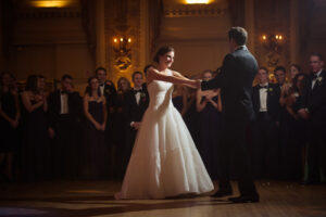 a bride and her father during their first dance at a hotel dupont wedding reception