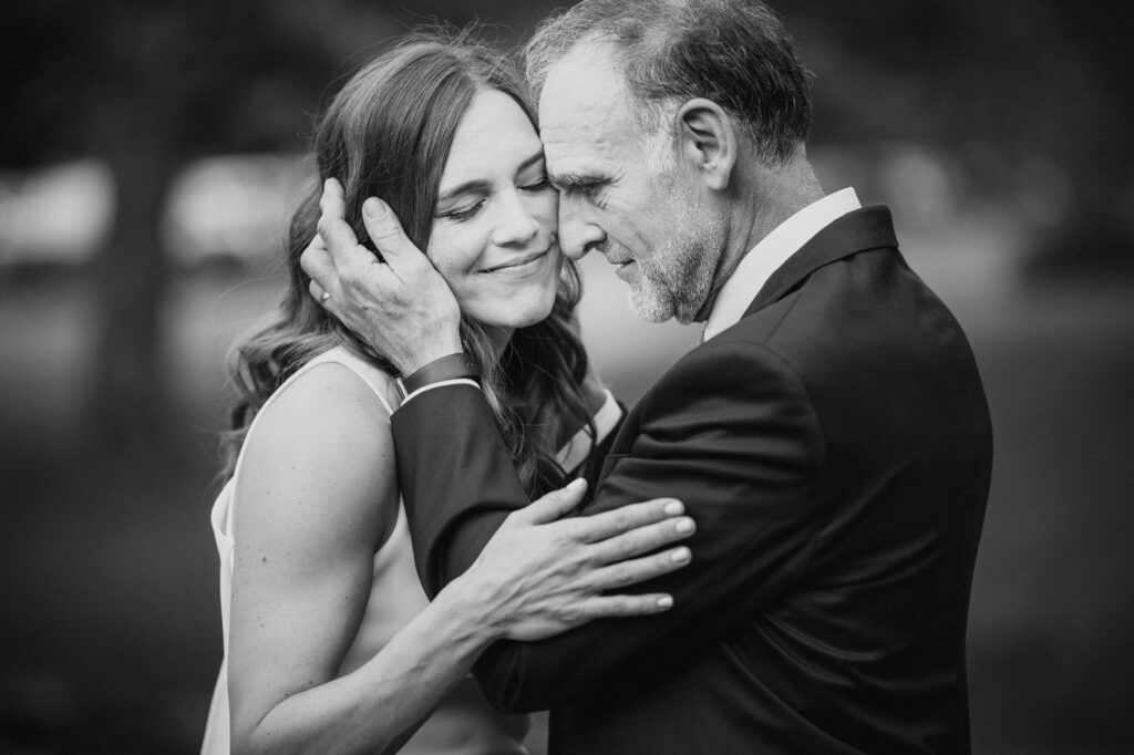 A tender moment between a bride and her dad at their Stonover Farm Wedding as they share a close dance.