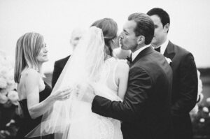 A black and white photo of a Resort at Pelican Hill wedding ceremony