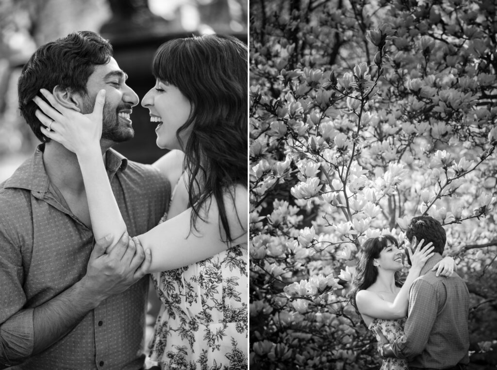 A couple joyfully embracing and laughing in Central Park, surrounded by blooming flowers.