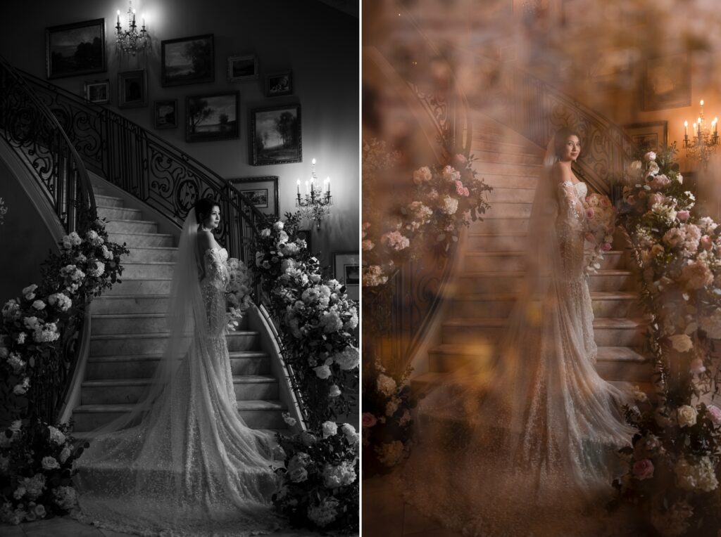 A bride stands in front of a grand staircase at her Park Chateau wedding, decorated with flowers and surrounded by lit candles. She wears a long, flowing dress with a veil, and framed pictures adorn the wall behind her.