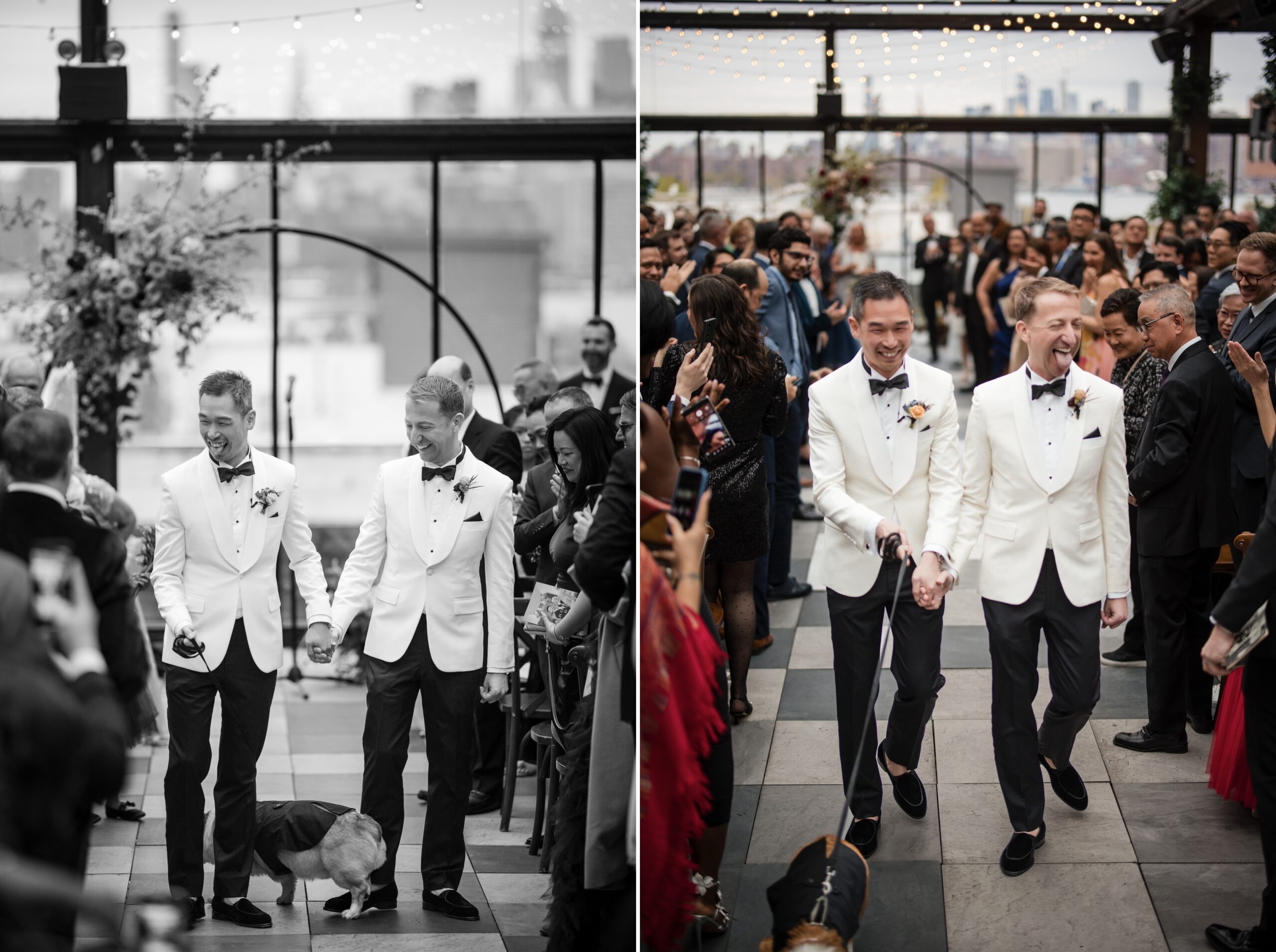 Two grooms in white tuxedos joyfully walk down the aisle holding hands, surrounded by applauding guests, with string lights and a cityscape in the background at their 74 Wythe