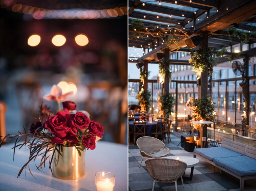 Two images showcasing elegant details from a 74 Wythe rooftop wedding: the left features a close-up of a table centerpiece with deep red roses in a gold vase, lit by soft candlelight; the right shows a cozy, inviting seating area under a pergola with hanging lights and greenery, providing a warm, ambient setting against an evening cityscape. 