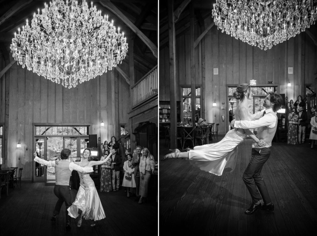 At a Nestldown wedding, a couple dances under a large chandelier inside a wooden hall. The bride is being lifted and spun around by the groom as guests watch in admiration.