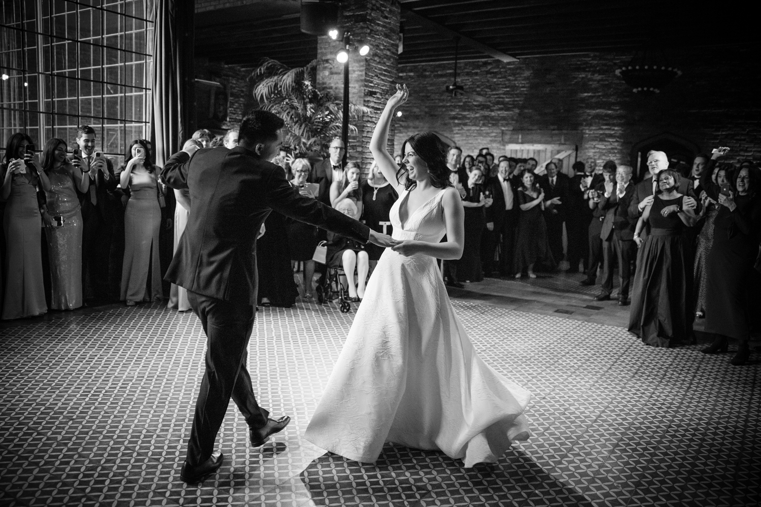 Married couple dance energetically and happy at a Bowery Hotel NYC wedding
