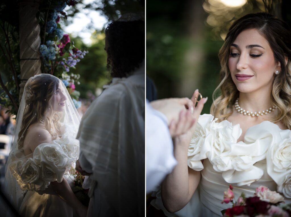 A bride in a white dress with floral details and a pearl necklace is pictured during an outdoor luxury summer NJ wedding. One image shows her under a veil, and the other shows her holding the groom's hand.