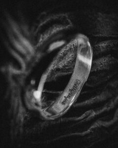 A wedding ring in black and white photo