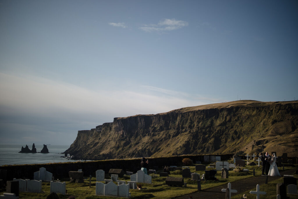 A cemetery right on the edge of the ocean.