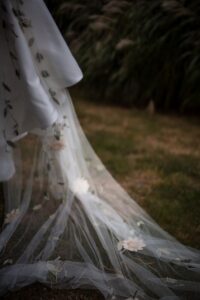 A wedding dress with flowers on it