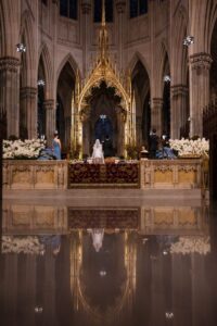 A wedding ceremony at the altar of St. Patrick’s Cathedral