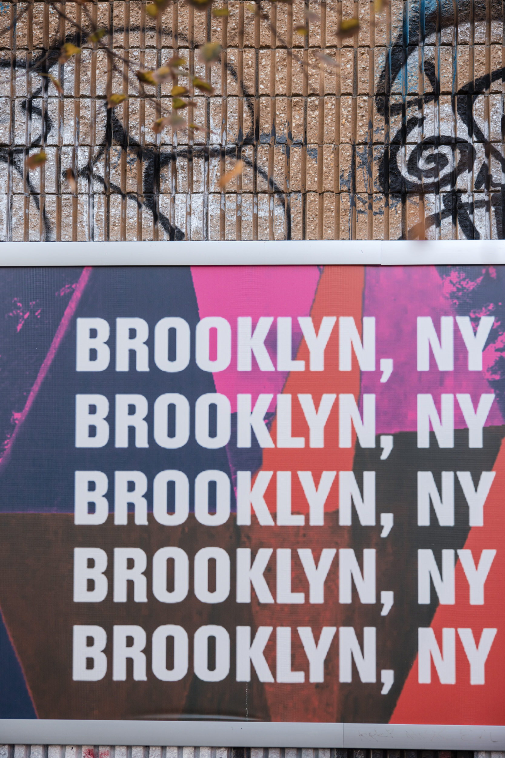 A billboard displays the words 